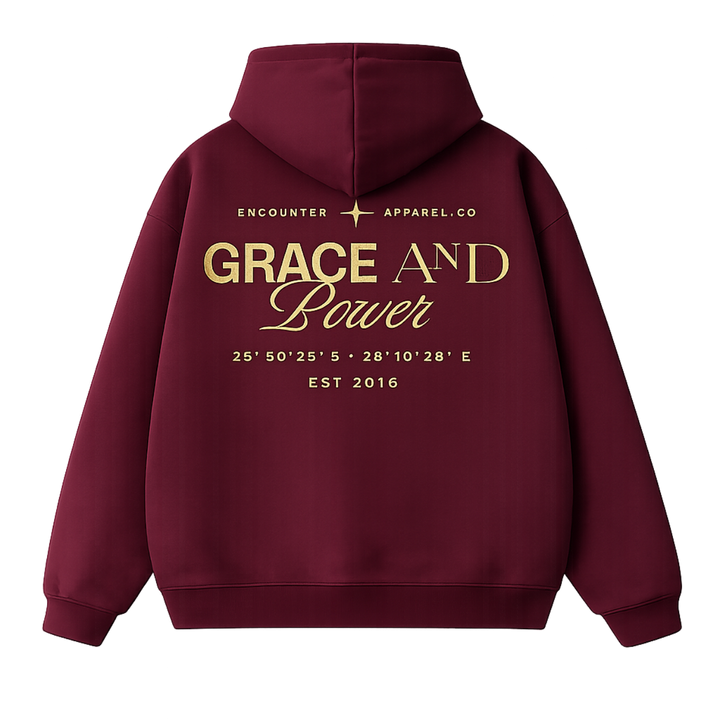 Maroon hoodie with gold text on the back on a white background