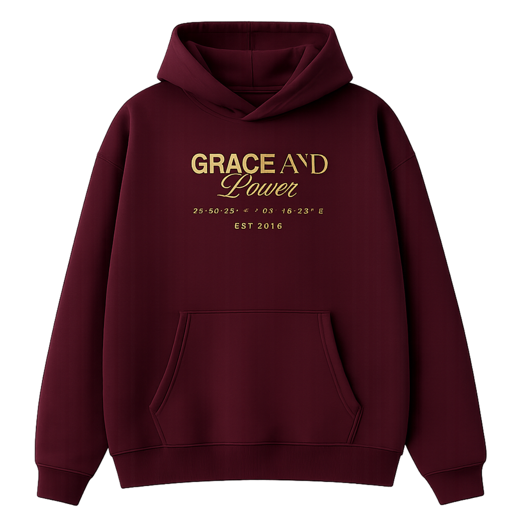 Maroon hoodie with gold text on a white background